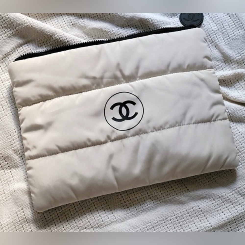 New rare and collectible puffy pouch,clutchor cosmetic bag with zipper in white